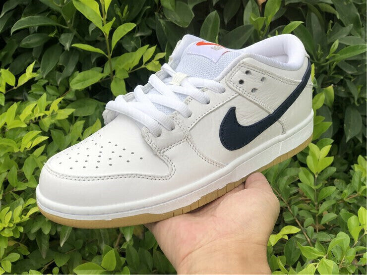 Orange label dunk shops low white